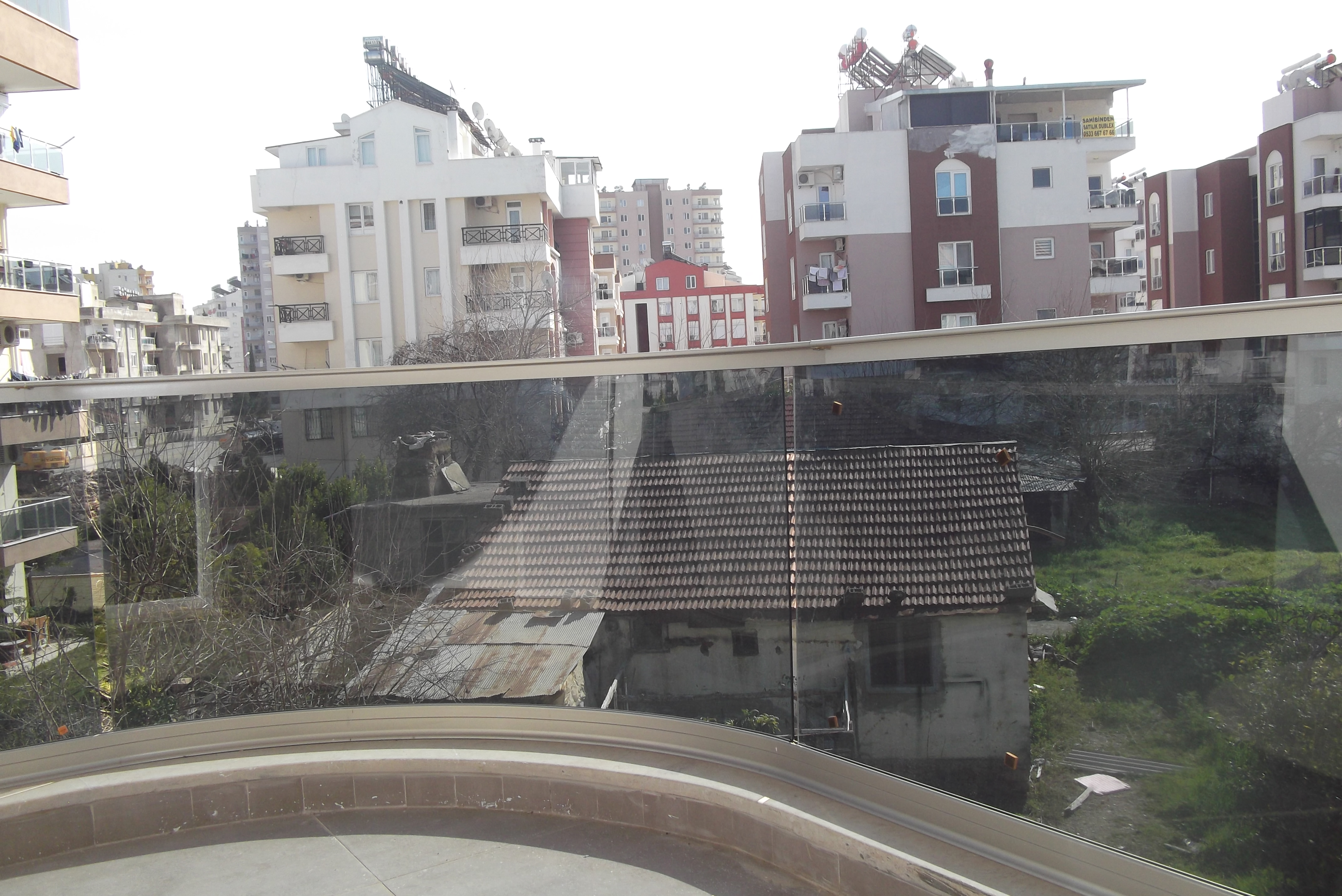 Bombeli Bükümlü Cam Balkon